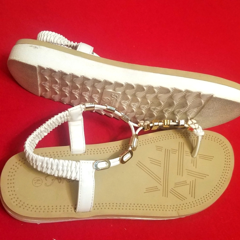 Women size 71/2 off white sandals